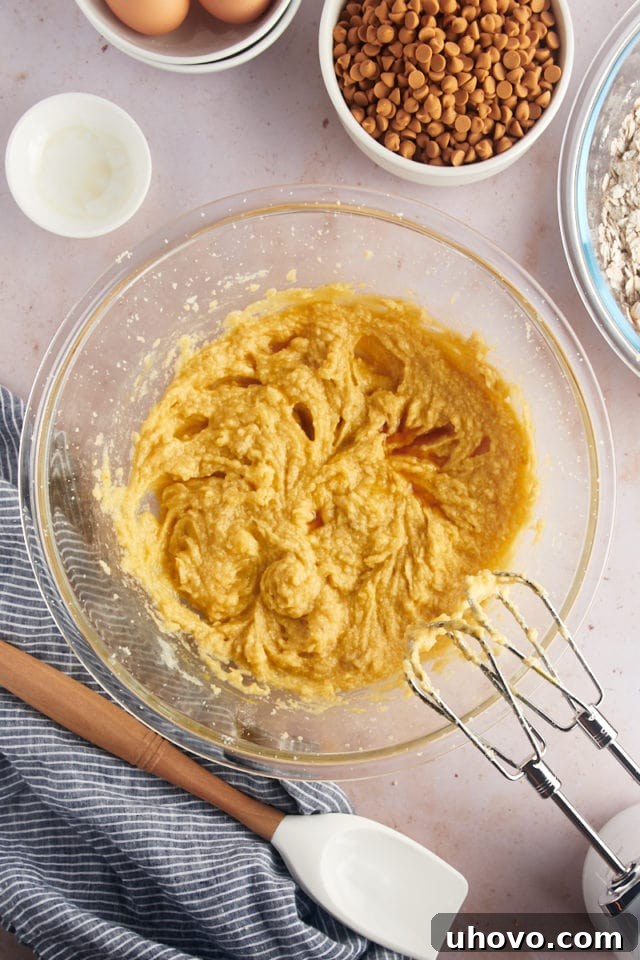 Overhead view of wet ingredients for oatmeal butterscotch cookies