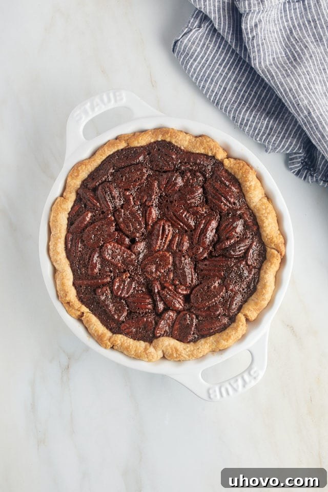 overhead view of freshly baked chocolate pecan pie