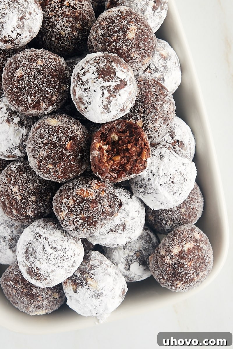 overhead view of bourbon balls piled on a white tray