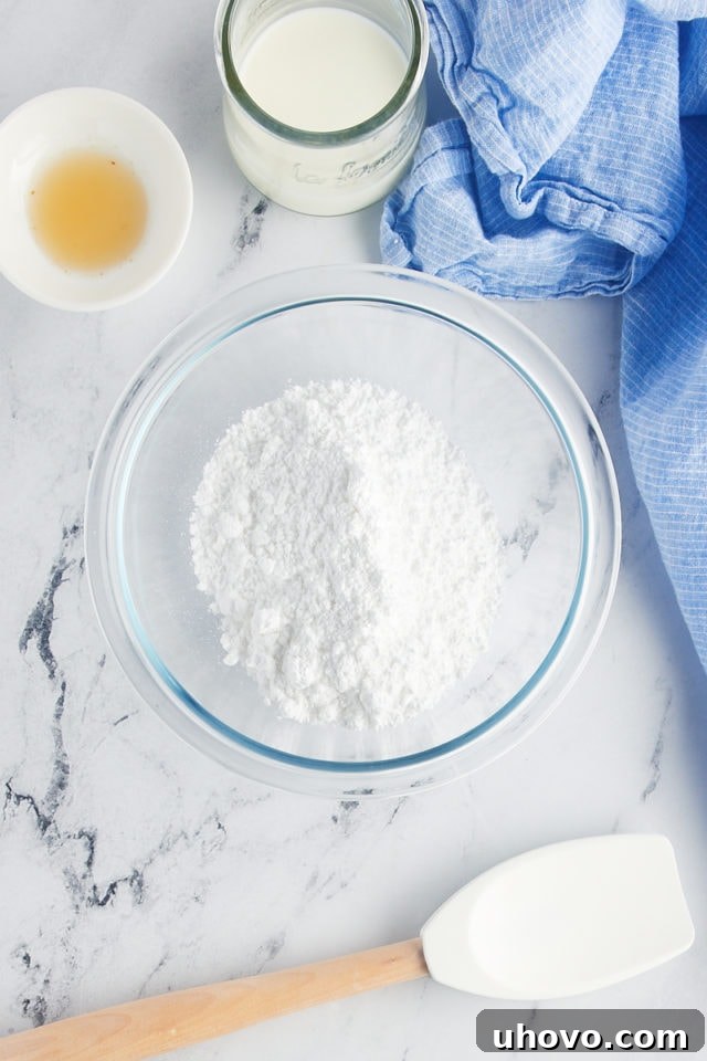 Overhead view of powdered sugar in bowl