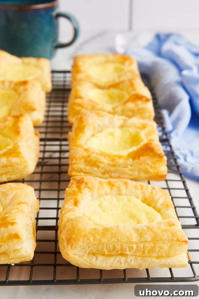Homemade cheese danishes on wire cooling rack