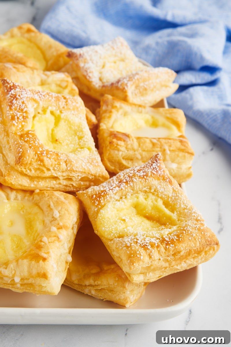 Platter with stack of cheese danishes