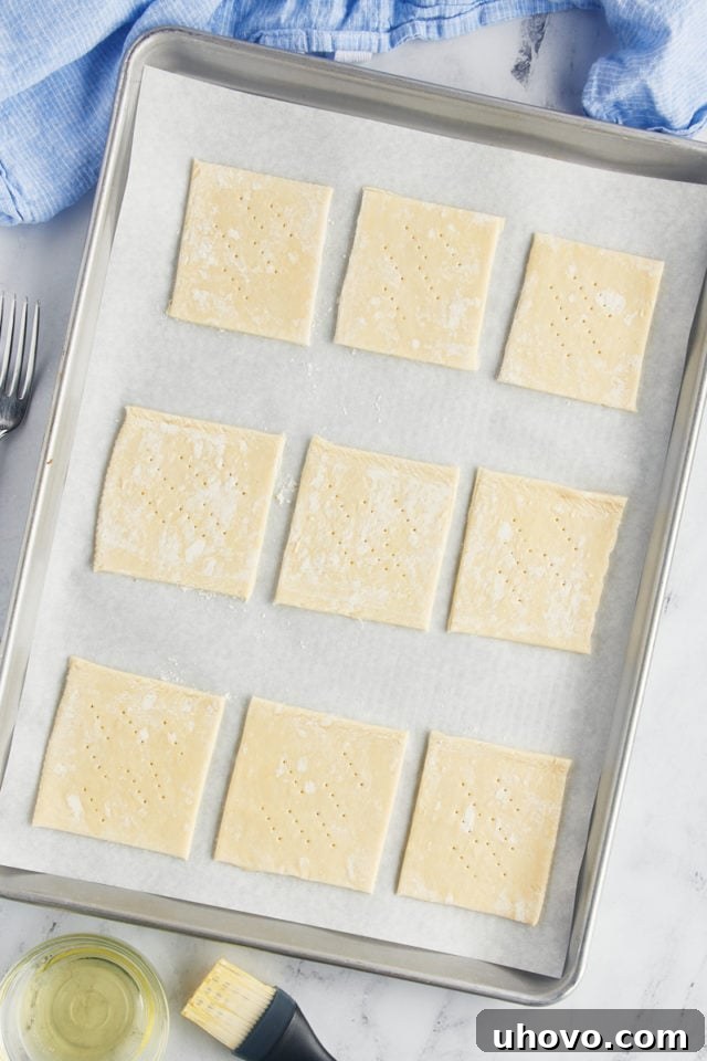 Overhead view of pastry squares on sheet pan