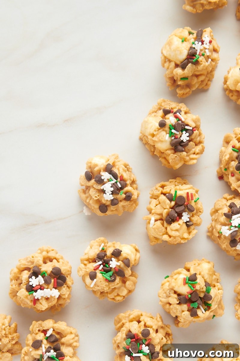 overhead view of avalanche cookies scattered on a marble countertop