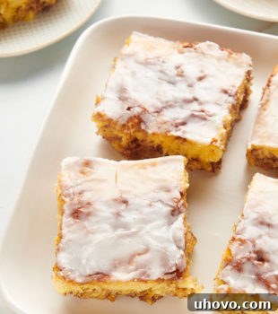 Squares of honey bun cake on platter