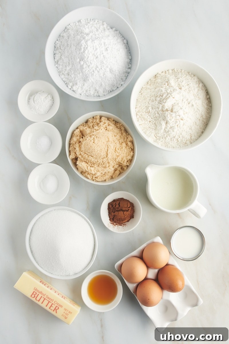 A vibrant overhead shot showcasing all the fresh, high-quality ingredients laid out for making a delicious honey bun cake from scratch, emphasizing the commitment to homemade goodness.