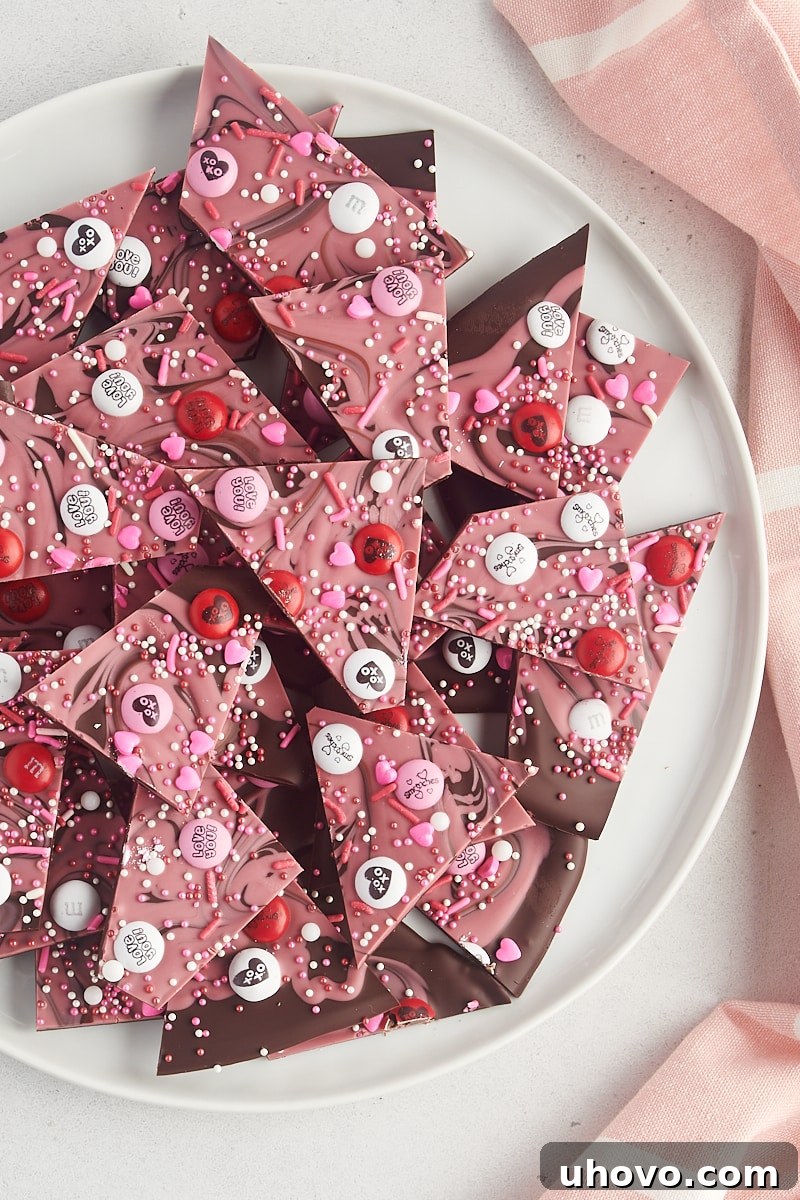 Overhead view of marbled Valentine's bark on a large white plate, ready for serving.