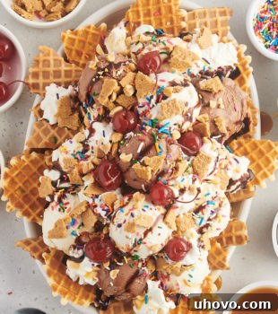 overhead view of ice cream nachos served on an oval white platter