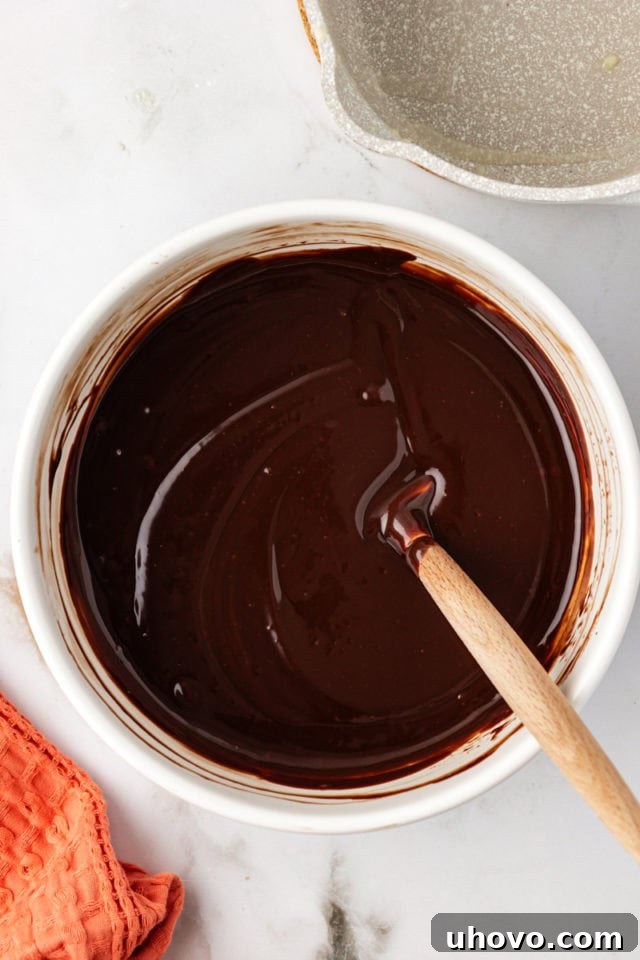 Smooth chocolate sauce in a mixing bowl