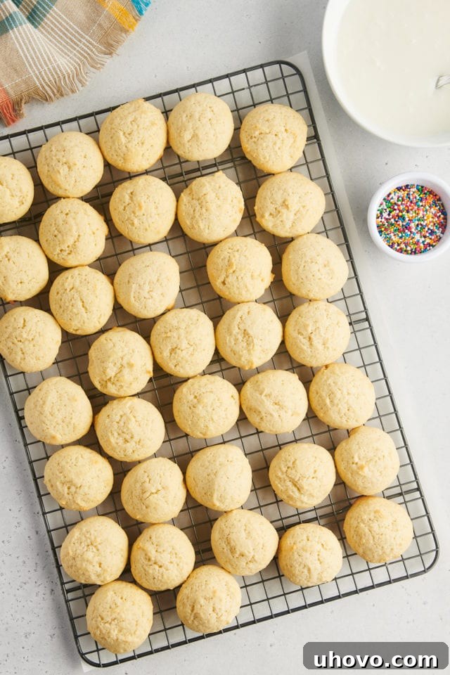 overhead view of sour cream cookies on a wire rack