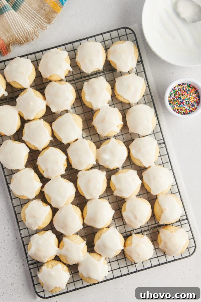 overhead view of glazed sour cream cookies on a wire rack