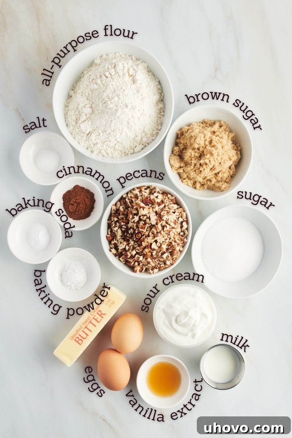 overhead view of ingredients for cinnamon pecan muffins