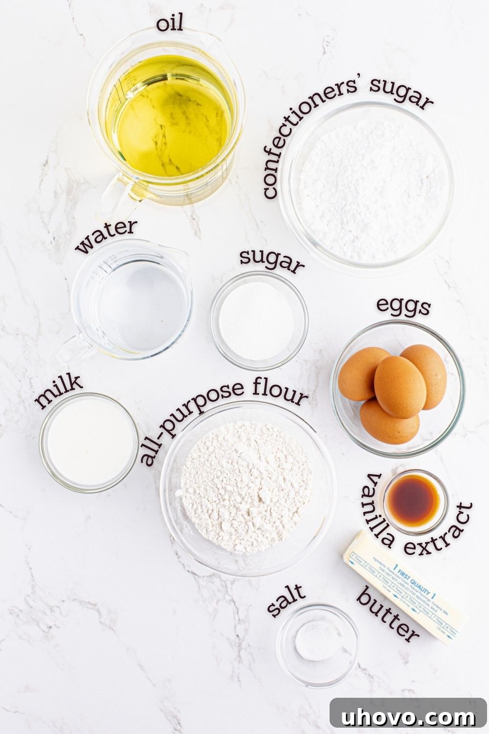 Overhead view of ingredients for French crullers with labels