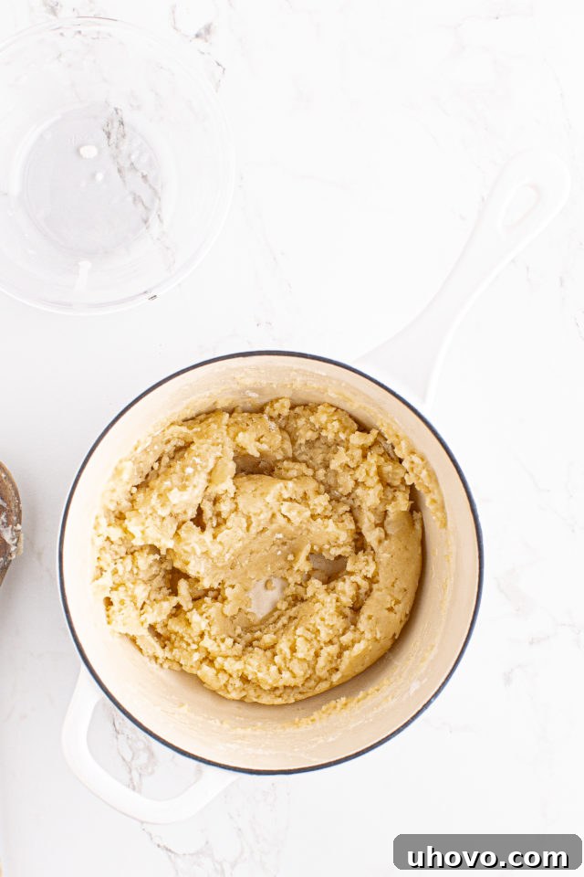 Overhead view of choux pastry in pot