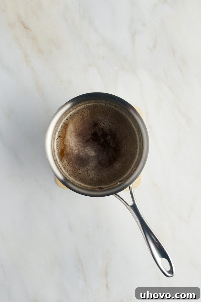 overhead view of browned butter in a saucepan