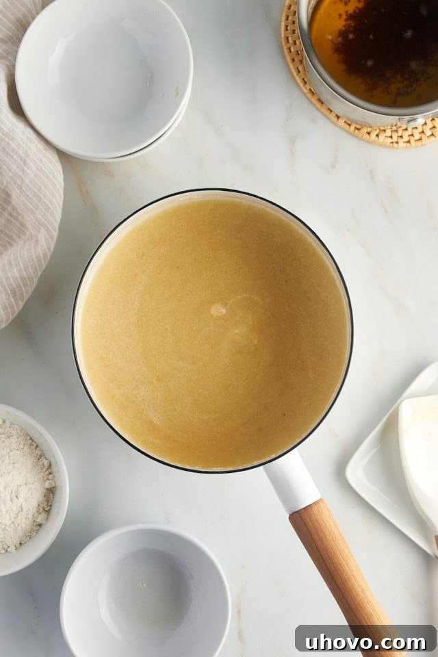 overhead view of warmed egg white mixture for financiers