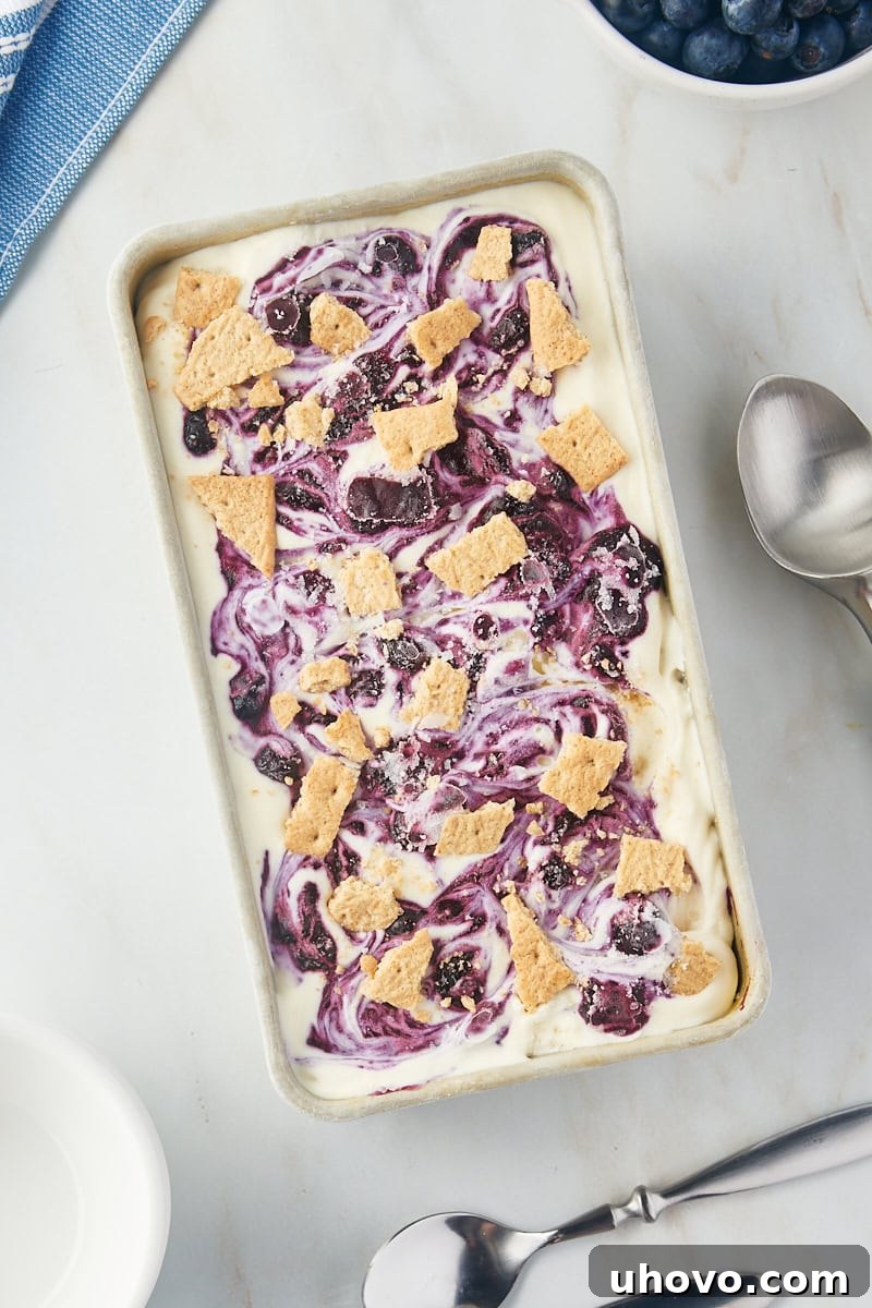 The finished Blueberry Cheesecake Ice Cream in a metal loaf pan, firm and ready to be scooped after 4 to 6 hours of freezing.