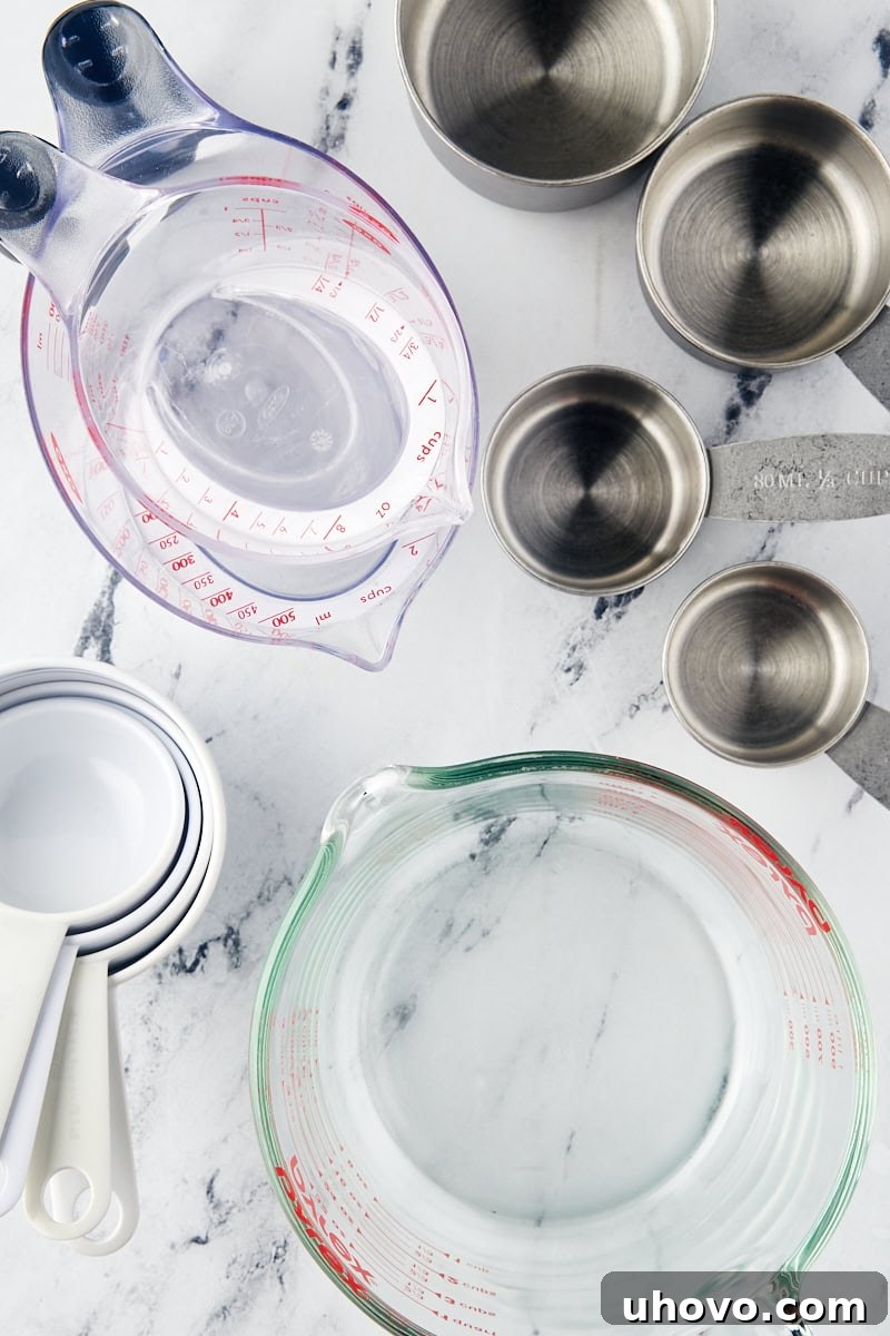 overhead view of various dry and wet measuring cups, showcasing their design differences