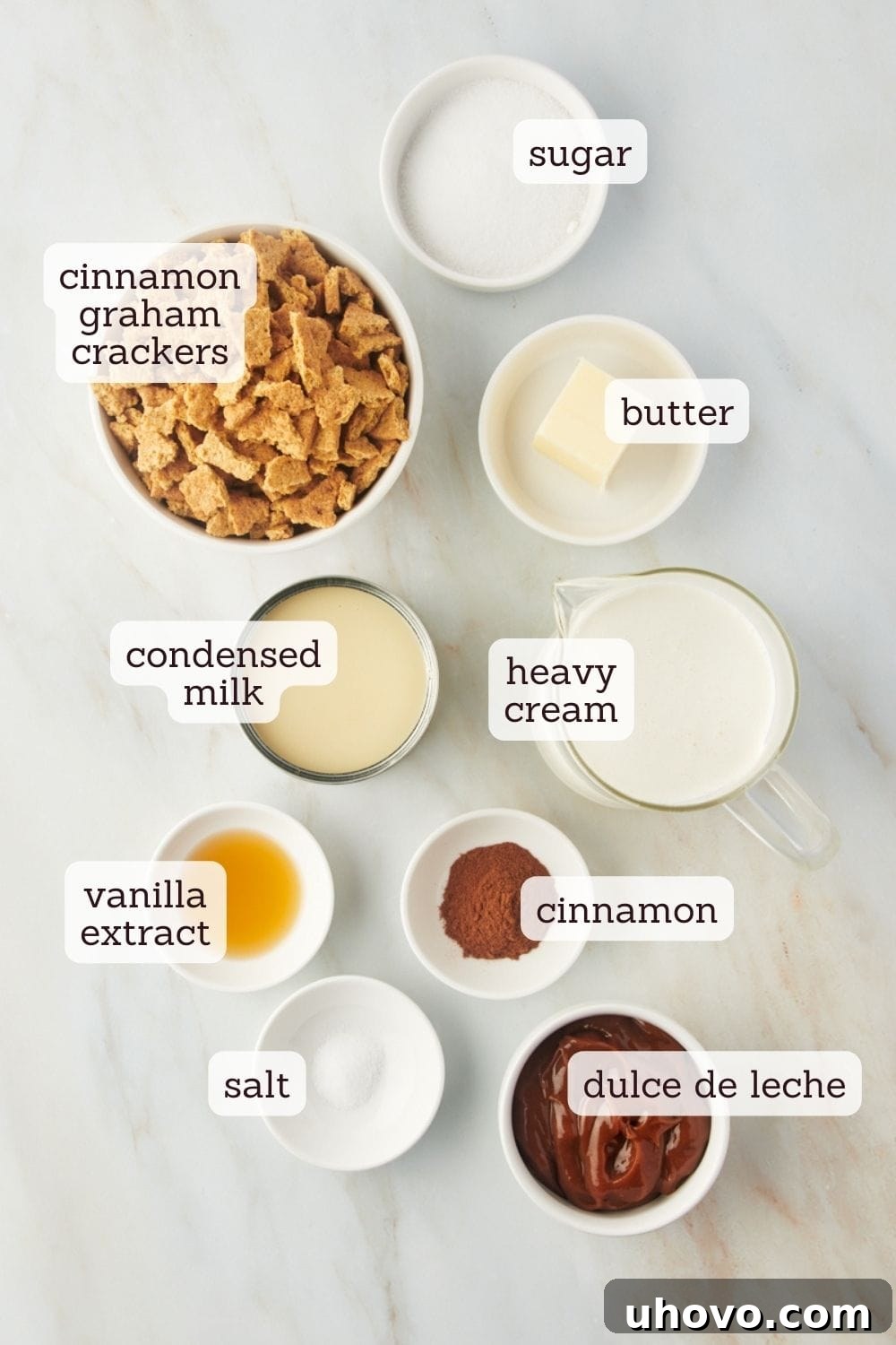 Overhead view of all ingredients for churro ice cream laid out on a table