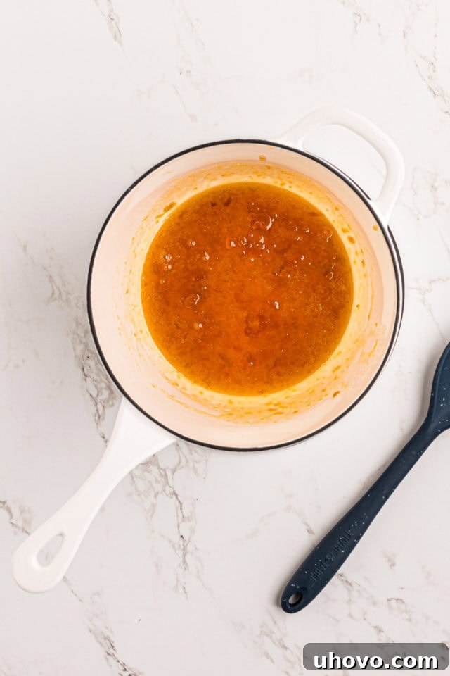 overhead view of apricot glaze in a saucepan