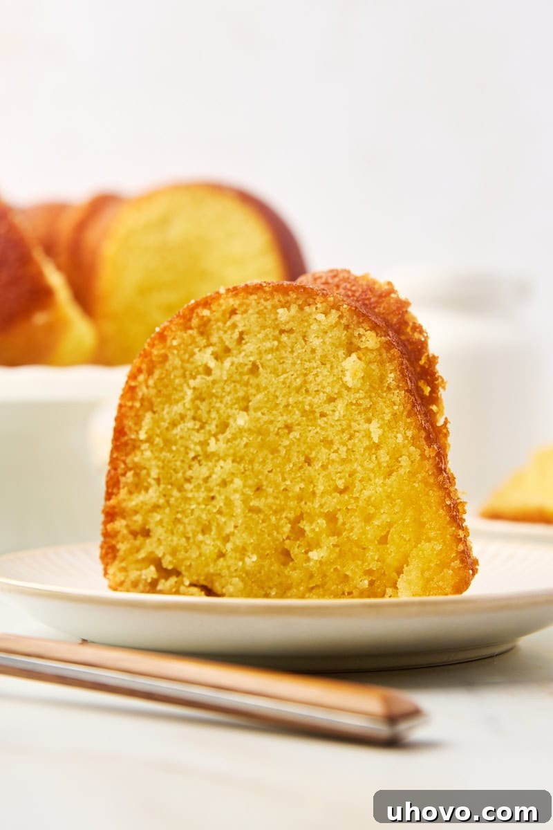 a slice of Kentucky butter cake on a white plate