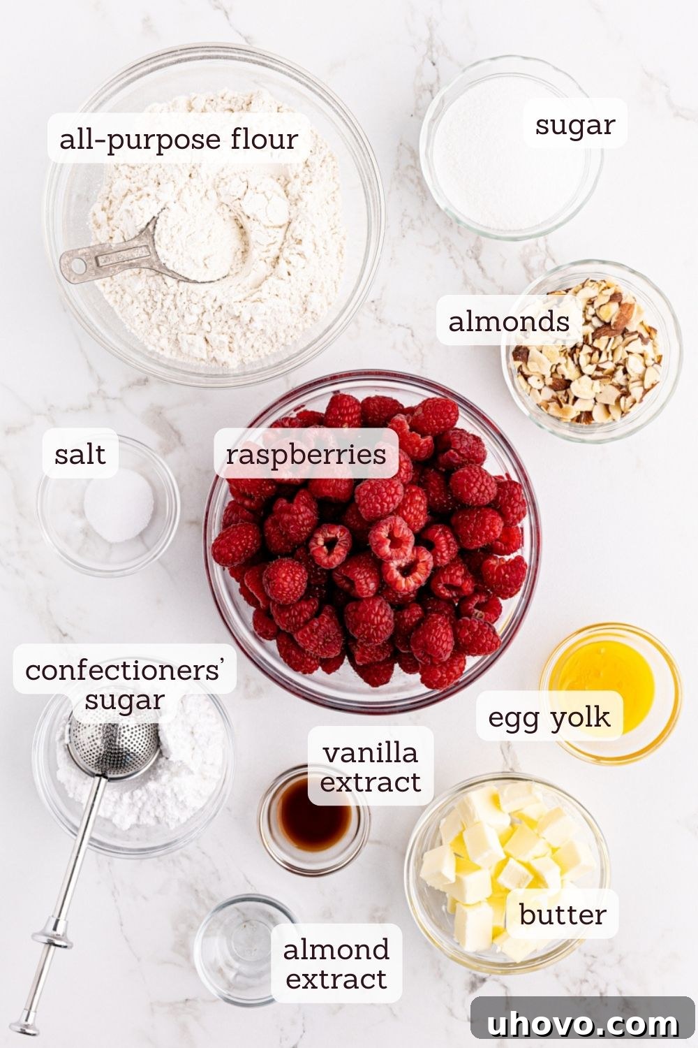 Overhead view of ingredients for raspberry crumb tart