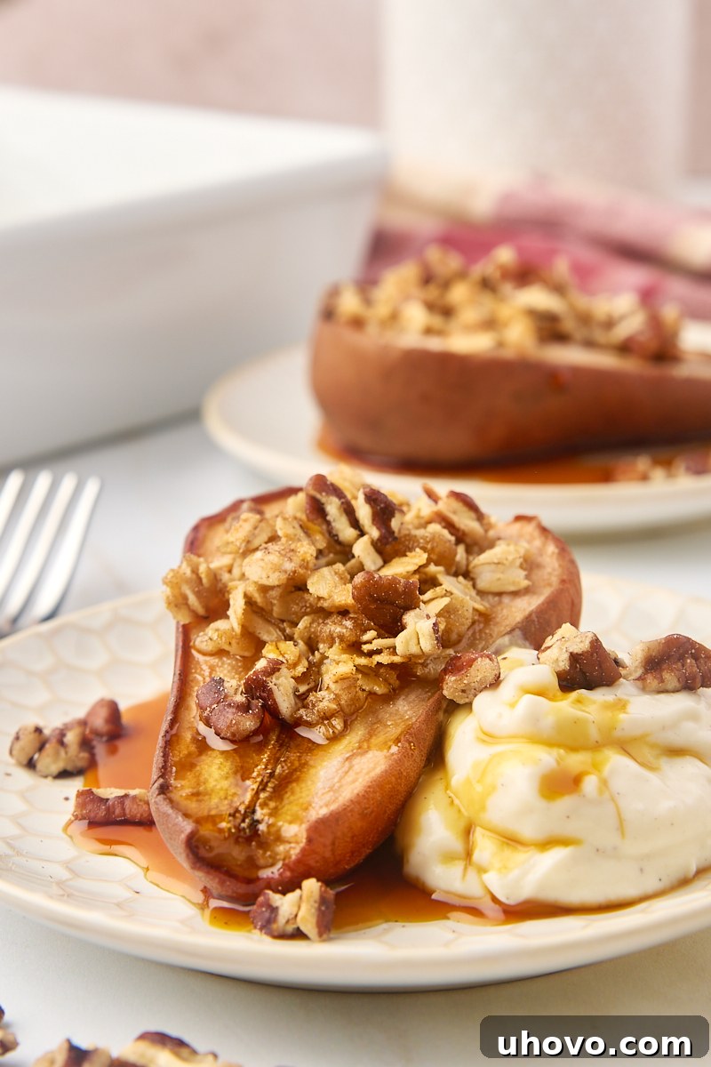 A close-up of a beautifully baked pear on a plate, adorned with a dollop of Greek yogurt, a cascade of maple syrup, and a scattering of toasted nuts, highlighting its inviting appeal.