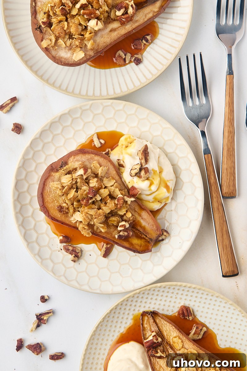 An inviting overhead photograph featuring three perfectly baked pears, each beautifully presented on individual plates, ready to be enjoyed.