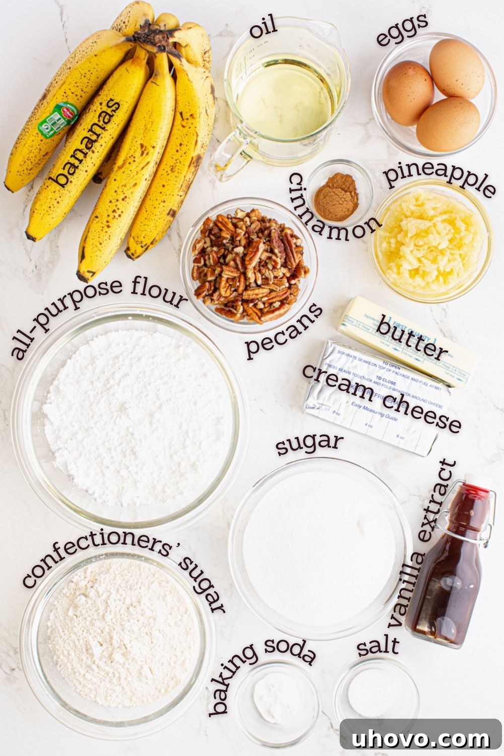 An overhead shot showcasing all the fresh ingredients perfectly laid out for making Hummingbird Cupcakes.