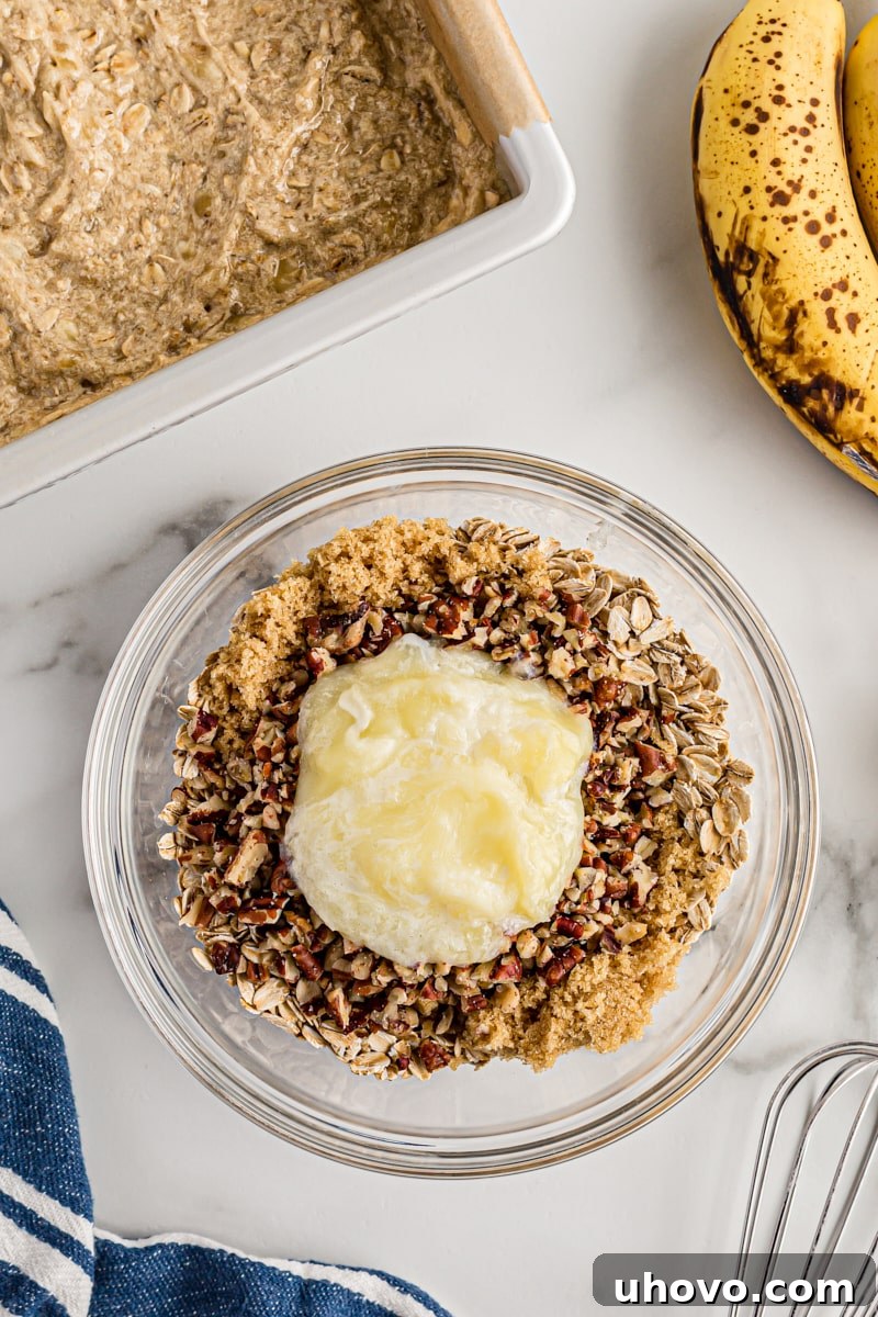 Overhead view of streusel topping in mixing bowl