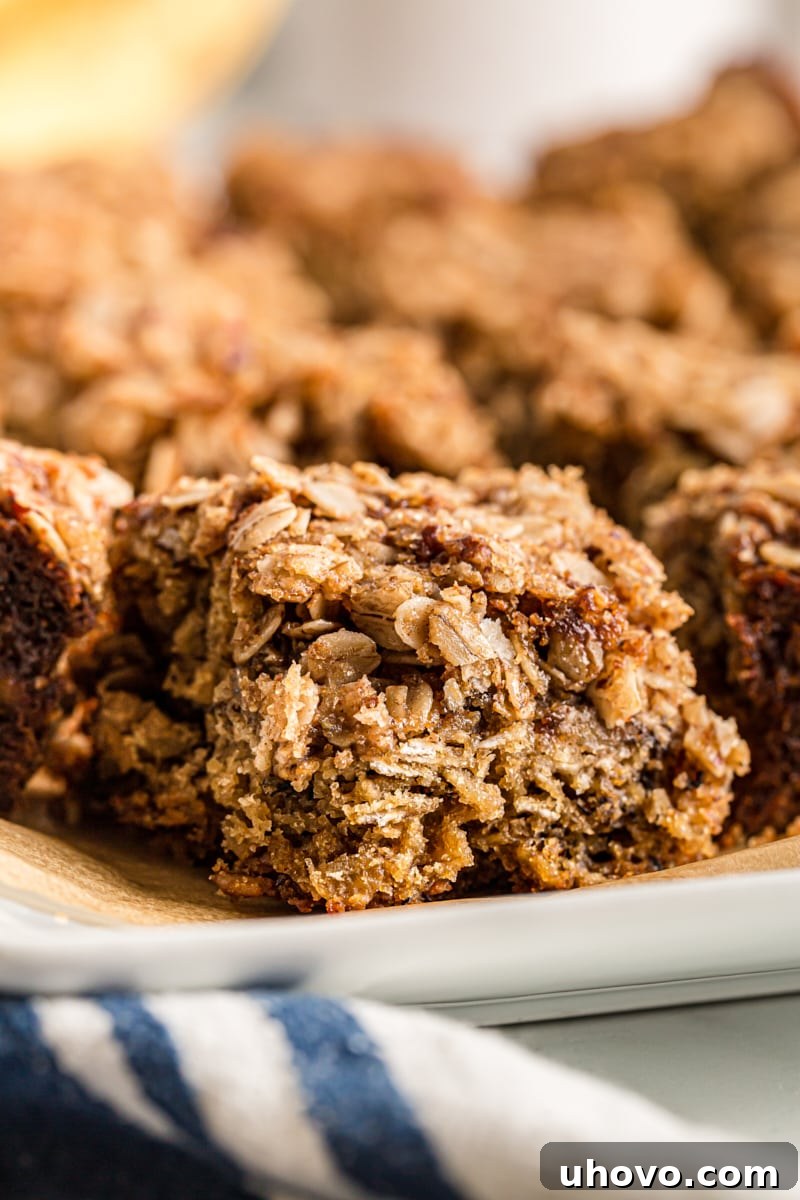Pieces of banana oatmeal crumb cake on tray