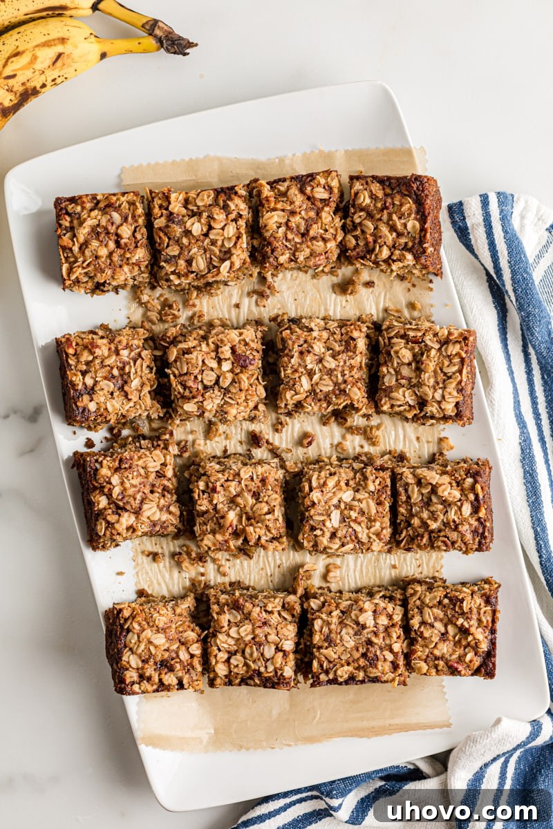 Overhead view of banana oatmeal crumb cake pieces on platter