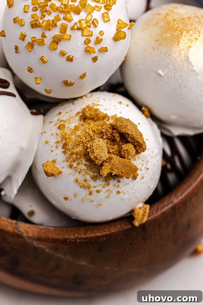 A close-up shot of gingerbread truffles in a wooden bowl, highlighting their inviting textures and festive decorations.
