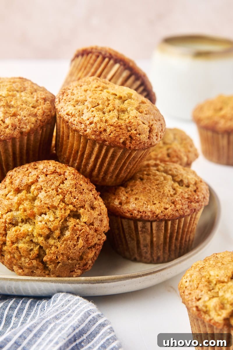 banana muffins piled on a plate