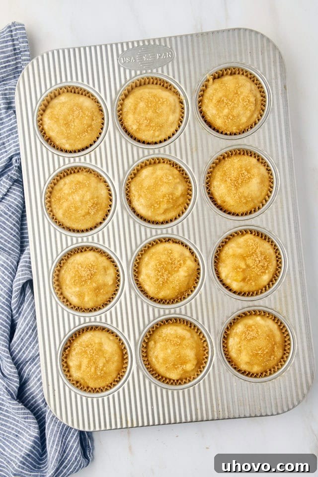 overhead view of portioned banana bread topped with coarse sugar