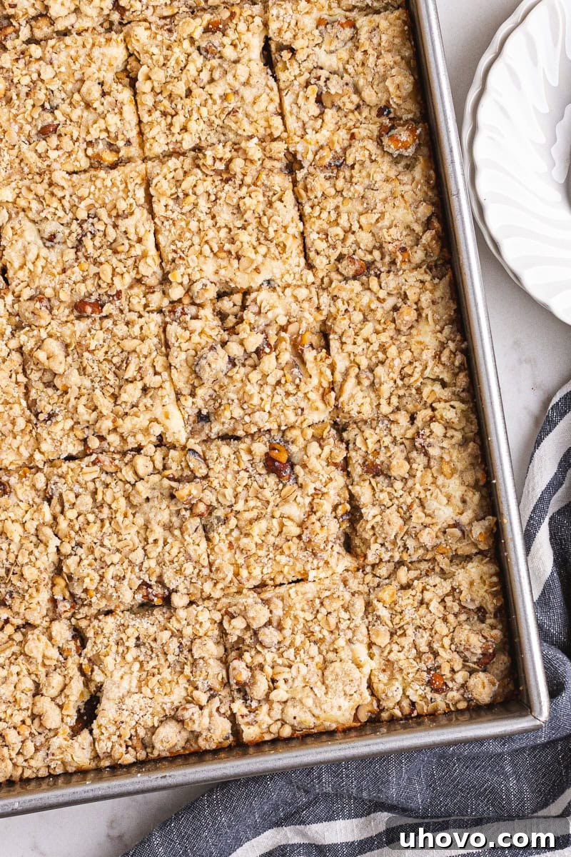 overhead view of apple butter cream cheese oat bars cut into bars
