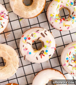 overhead view of baked doughnuts on a wire rack