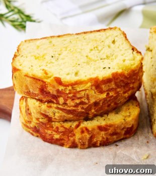 stack of three slices of herb and cheese quick bread