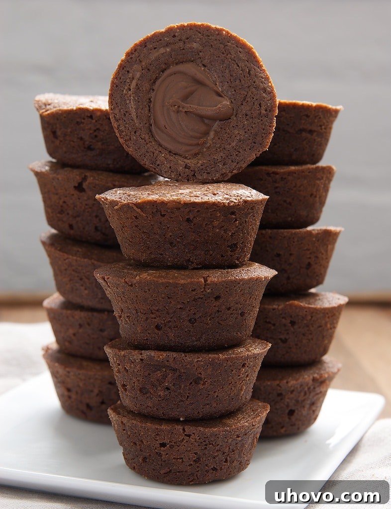 Chocolate Hazelnut Brownie Cups are rich brownies filled with chocolate-hazelnut spread. A great quick and easy dessert!