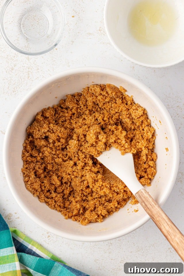 graham cracker crust mixture in a white bowl