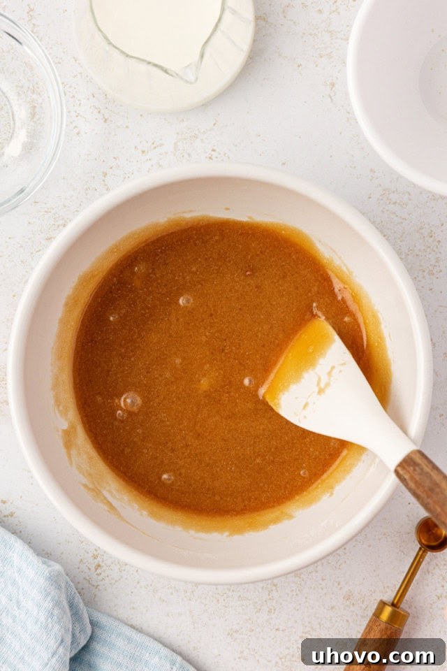 overhead view of caramel filling in a white mixing bowl