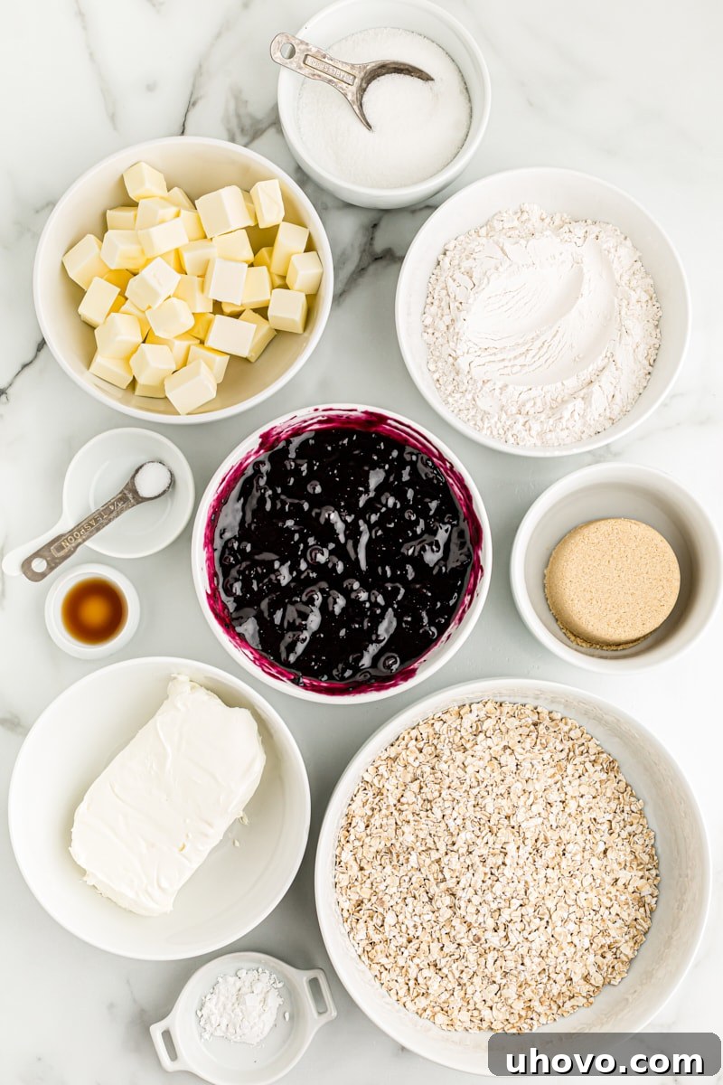Overhead view of ingredients for blueberry jam cream cheese bars