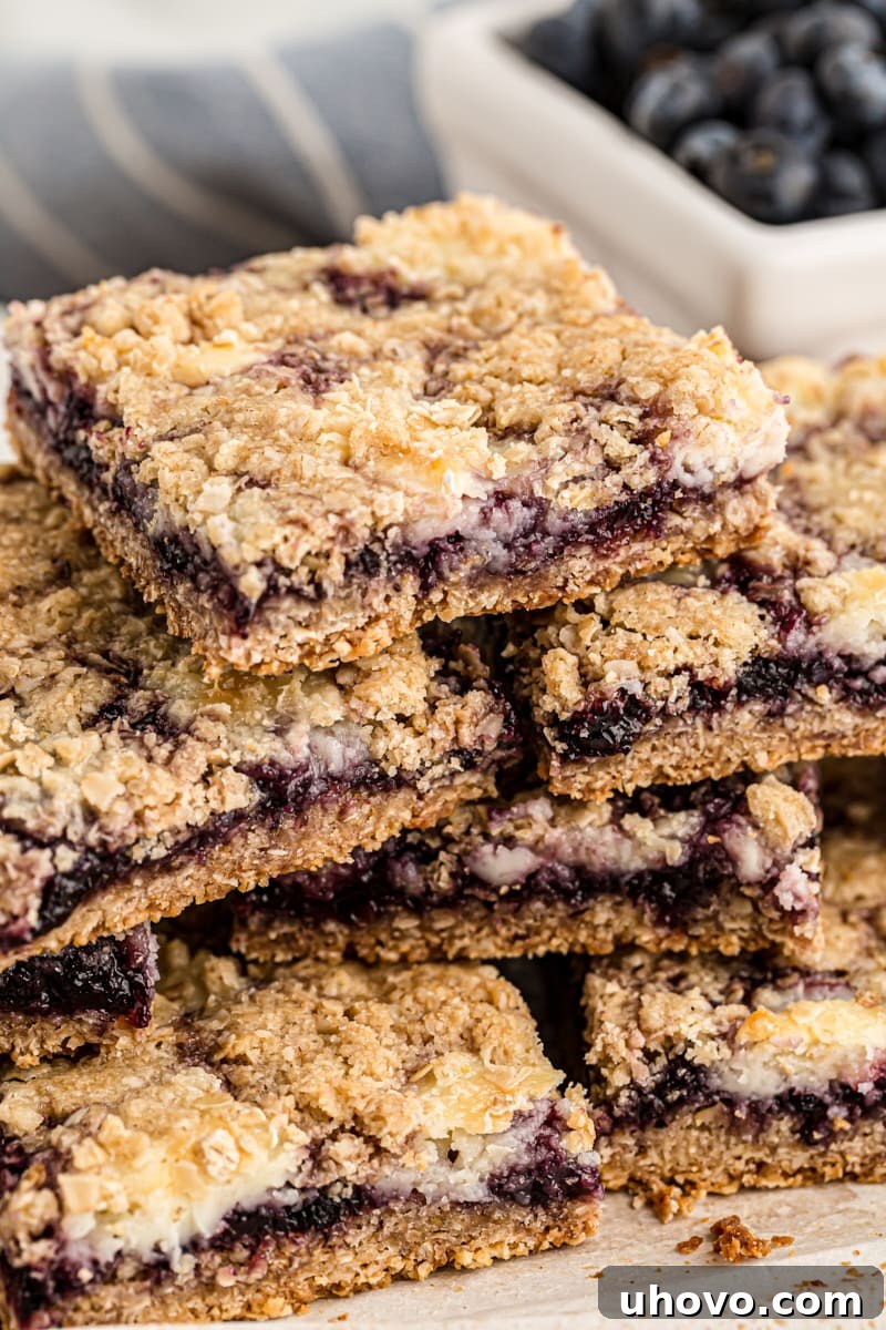 Stack of blueberry jam cream cheese bars