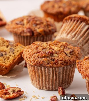 A beautifully baked pecan praline muffin ready to be enjoyed.