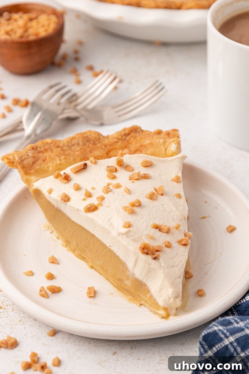 a slice of butterscotch pie on a white plate