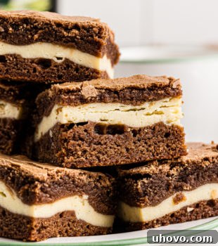 Side view of Irish cream brownies on plate, showing layers