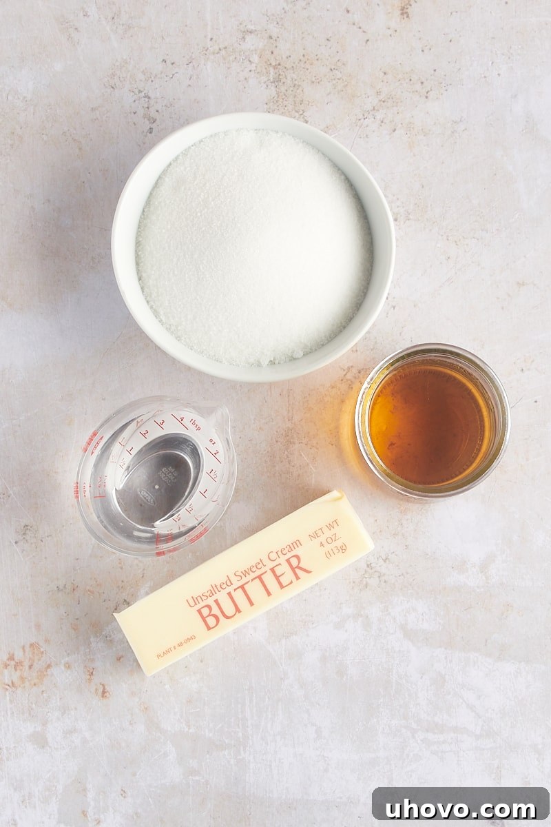 Overhead view of ingredients for the rum glaze, including butter, water, sugar, and rum.