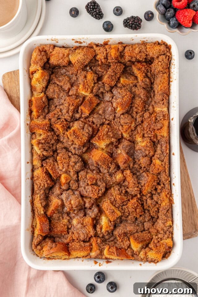overhead view of freshly baked overnight French toast in a white rectangular pan