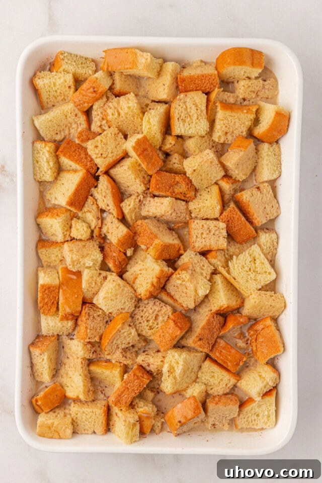 overhead view of baked French toast assembled and ready to refrigerate before baking