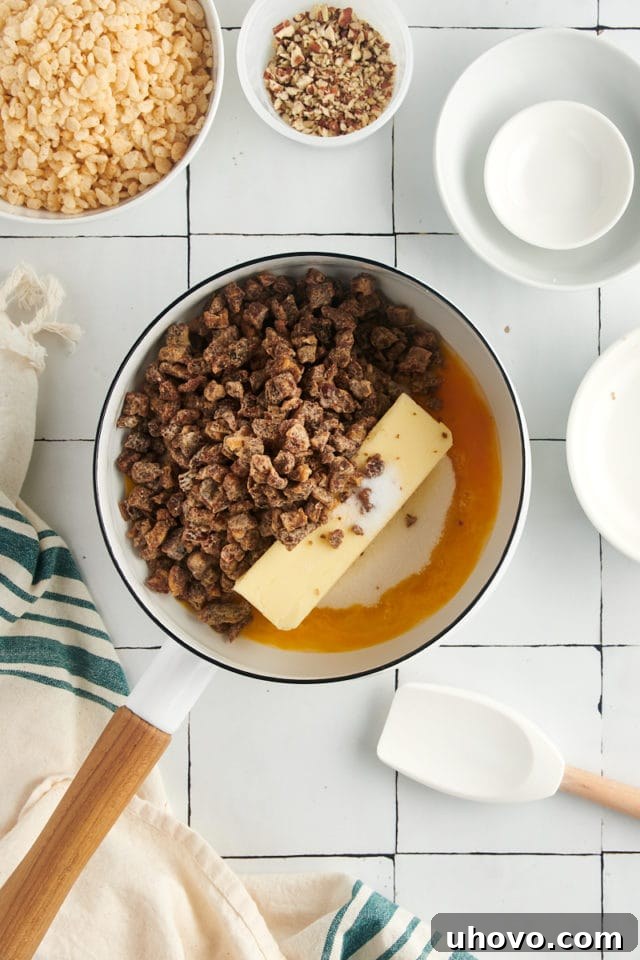 Overhead view of butter, sugar, egg, salt, and chopped dates being combined in a saucepan